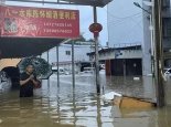 贵州多地暴雨降雨量近200毫米 消防员转移受困群众100余人