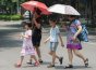 重庆多地遭遇高温热浪高达35℃ 部分地区或有暴雨天气